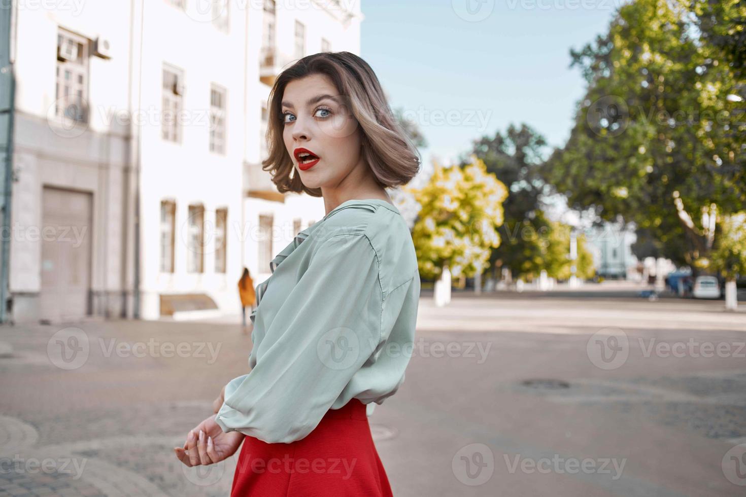 woman walking in the square outdoors leisure fun photo