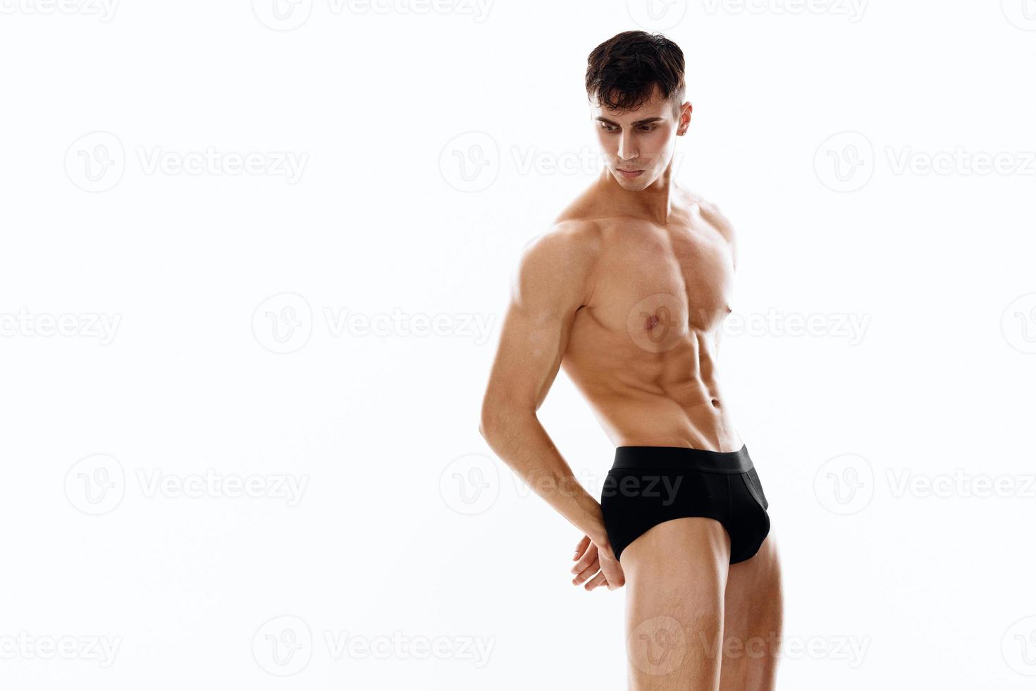 young guy with athletic physique Copy Space side view model photo