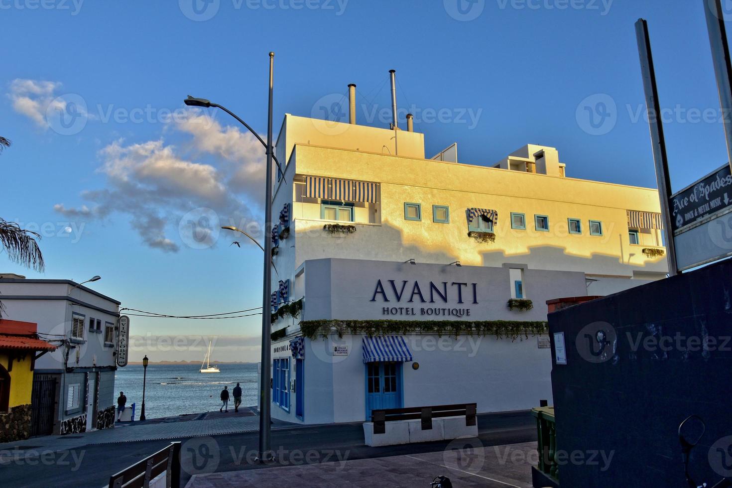 view of the white houses with blue shutters on the background of the oceans on the Spanish island of Furertaventra photo