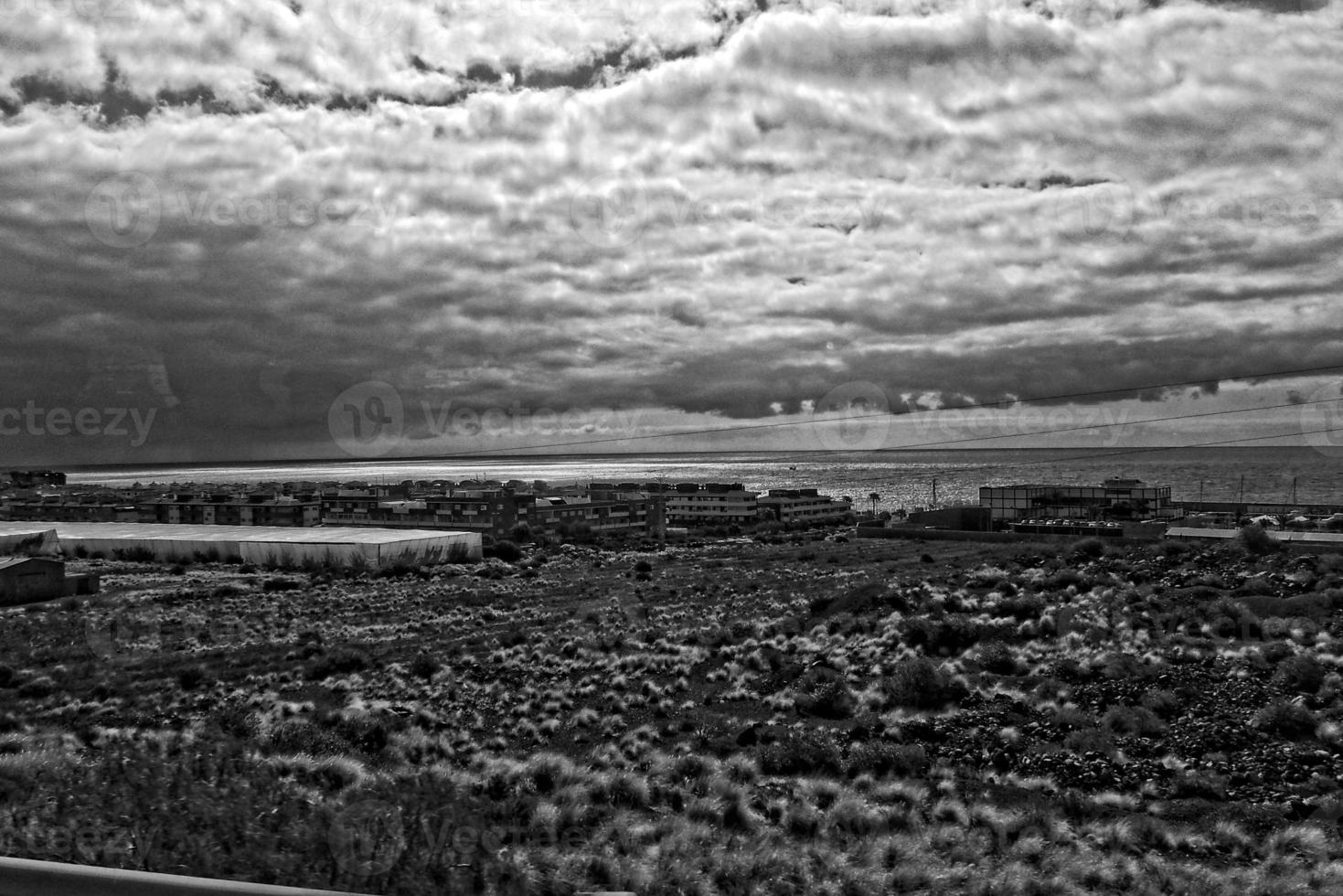 landscapes from the Spanish island of Tenerife with the highway and the ocean photo