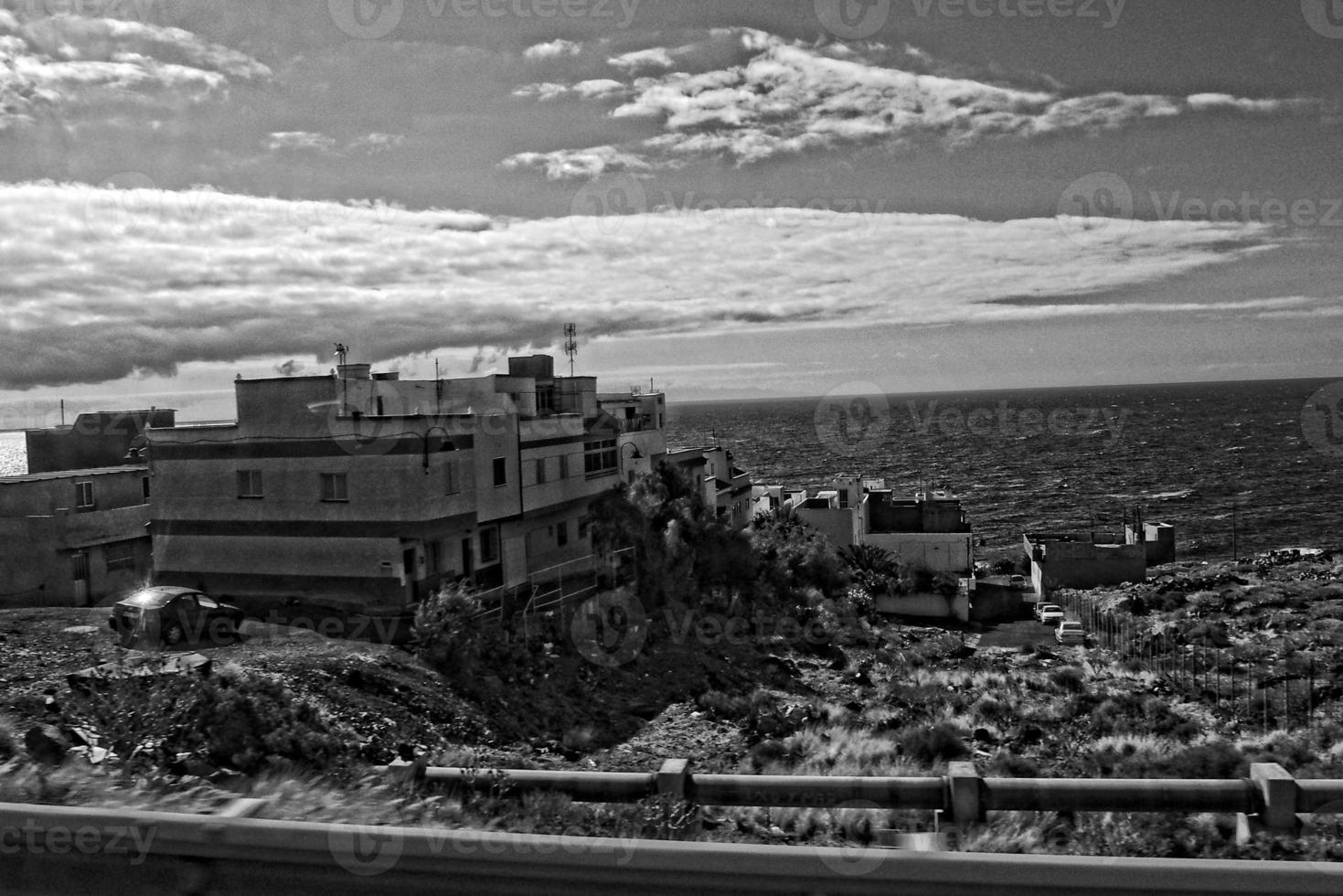 landscapes from the Spanish island of Tenerife with the highway and the ocean photo