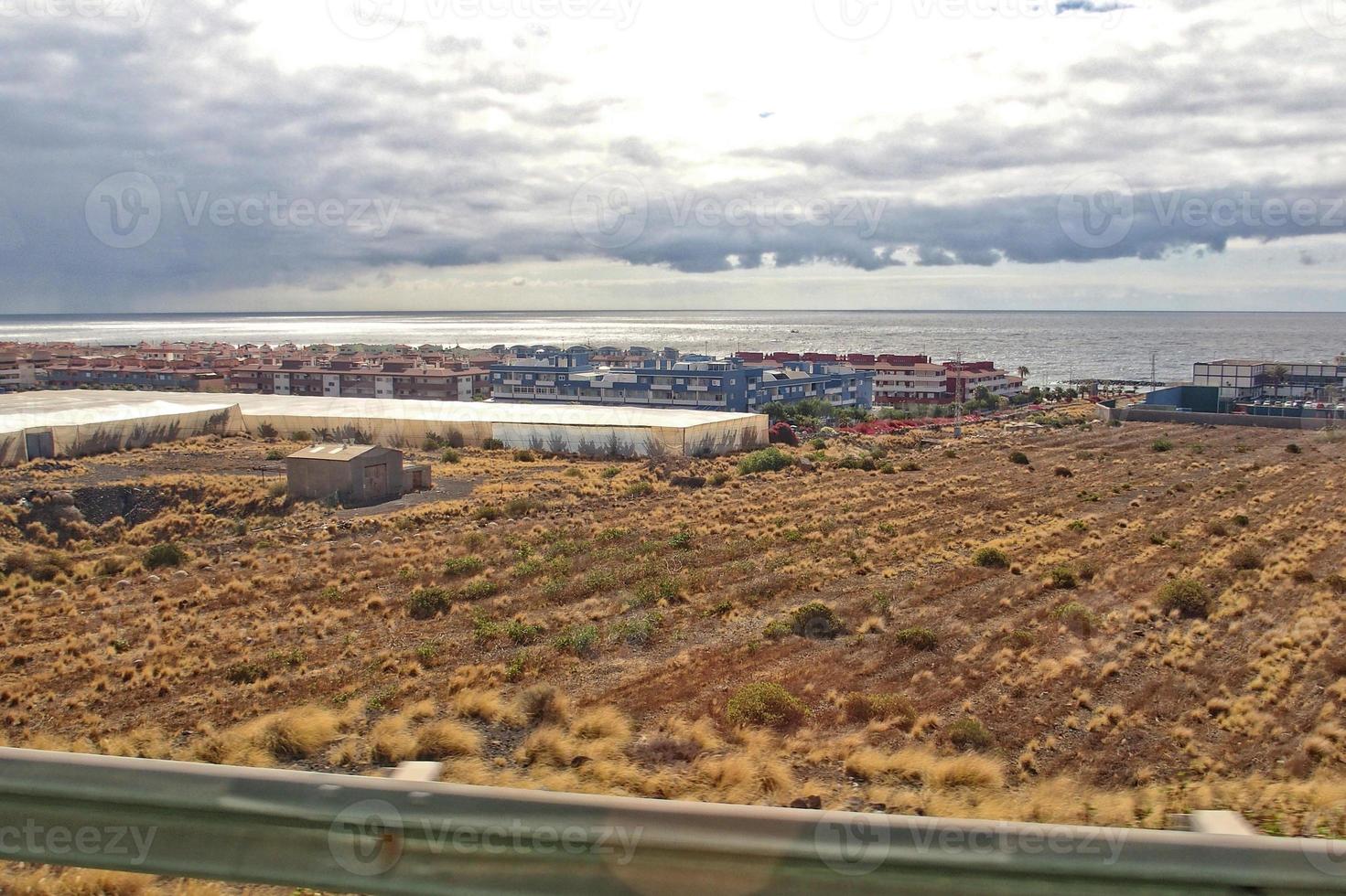 landscapes from the Spanish island of Tenerife with the highway and the ocean photo