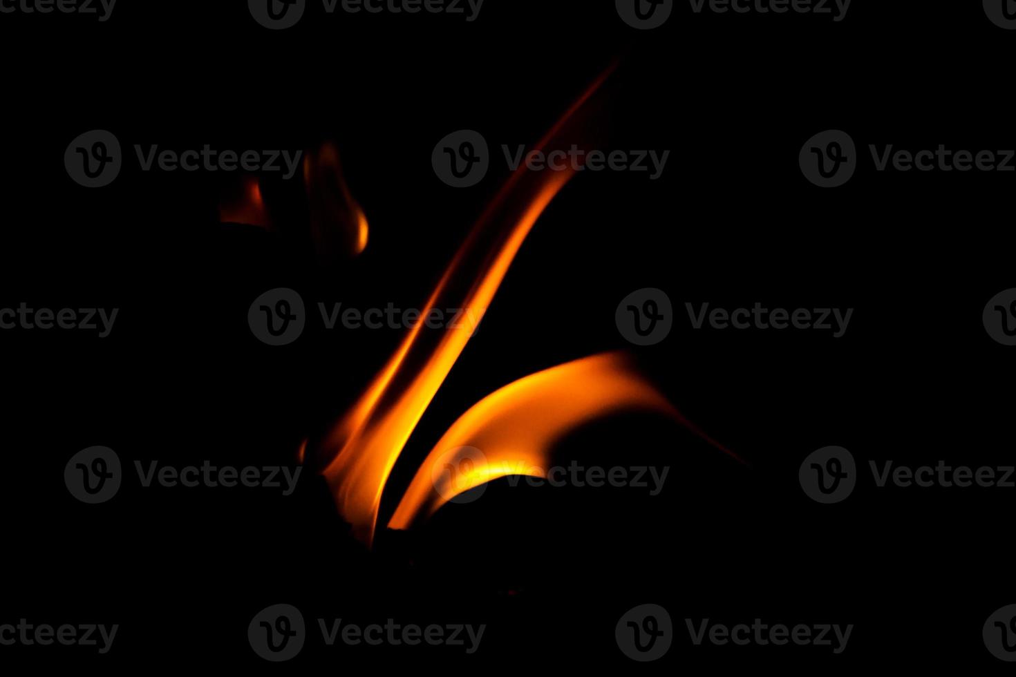 Fire flame texture. Burning material backdrop. Burn effect pattern. Blaze and torch wallpaper. Heat and haze backdrop. photo