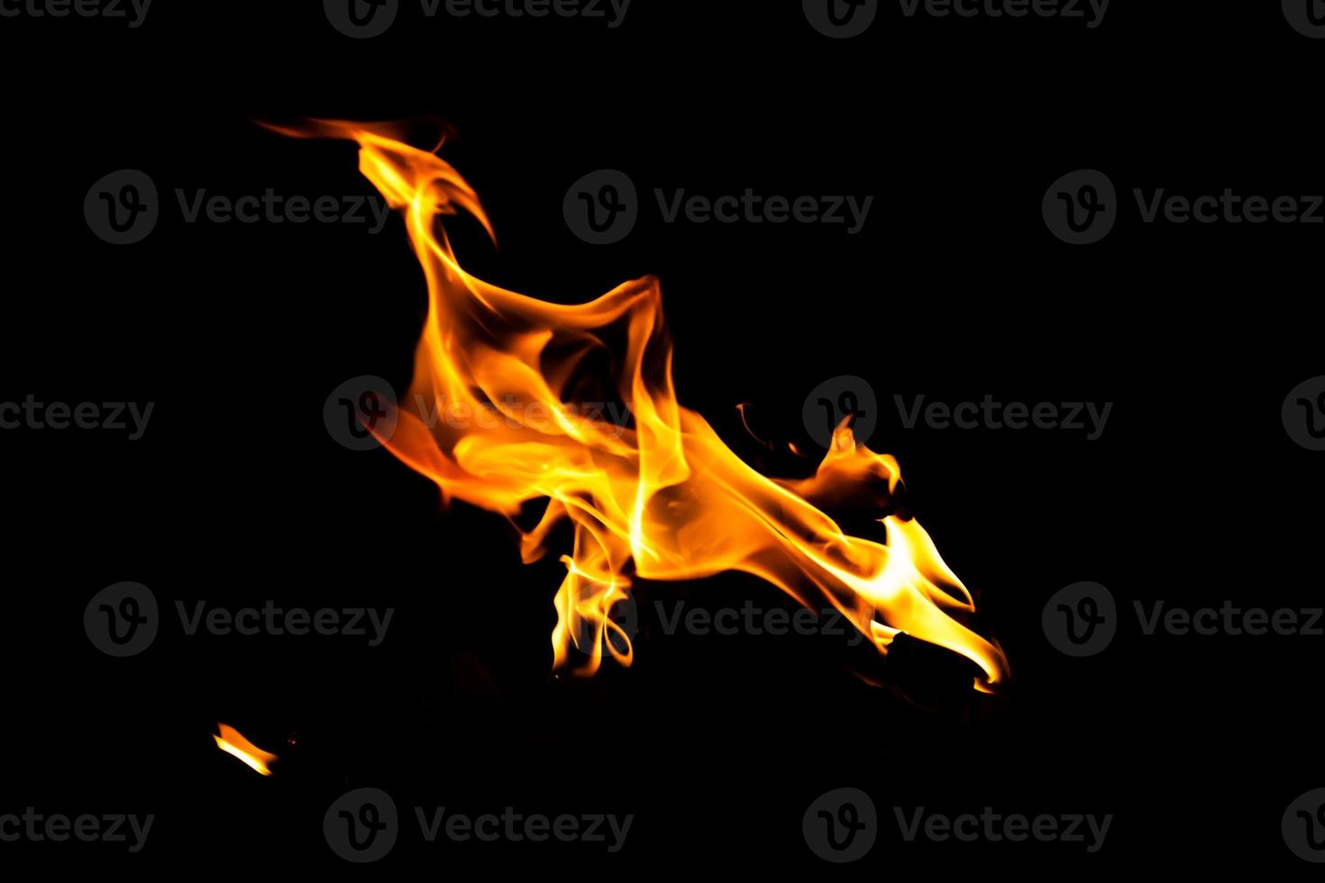 Fire flame texture. Burning material backdrop. Burn effect pattern. Blaze and torch wallpaper. Heat and haze backdrop. photo