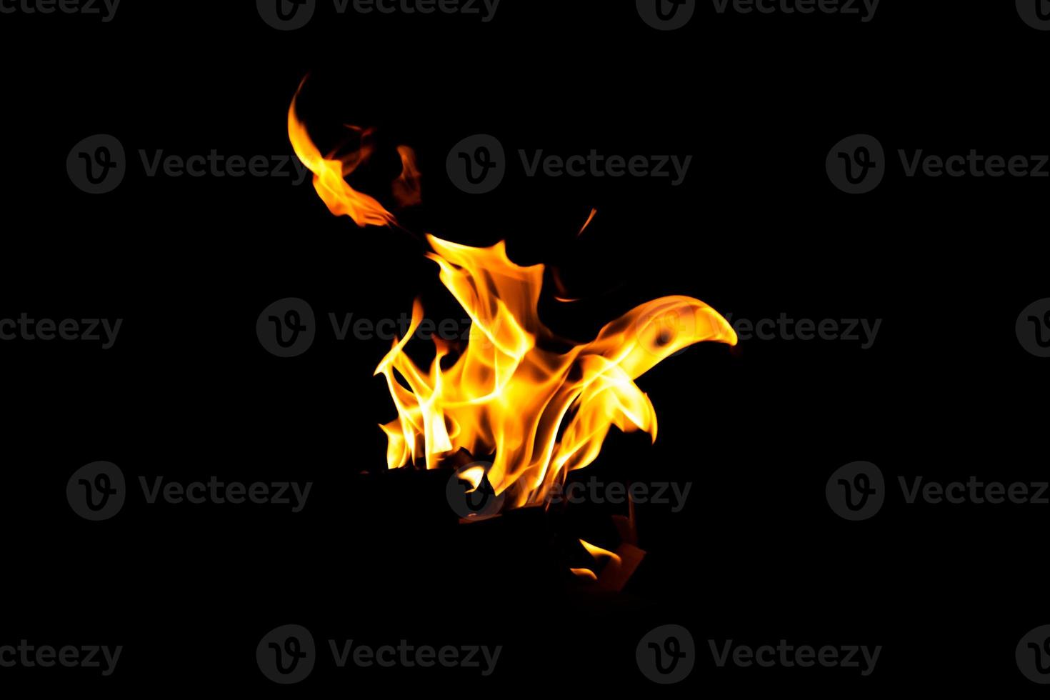 Fire flame texture. Burning material backdrop. Burn effect pattern. Blaze and torch wallpaper. Heat and haze backdrop. photo