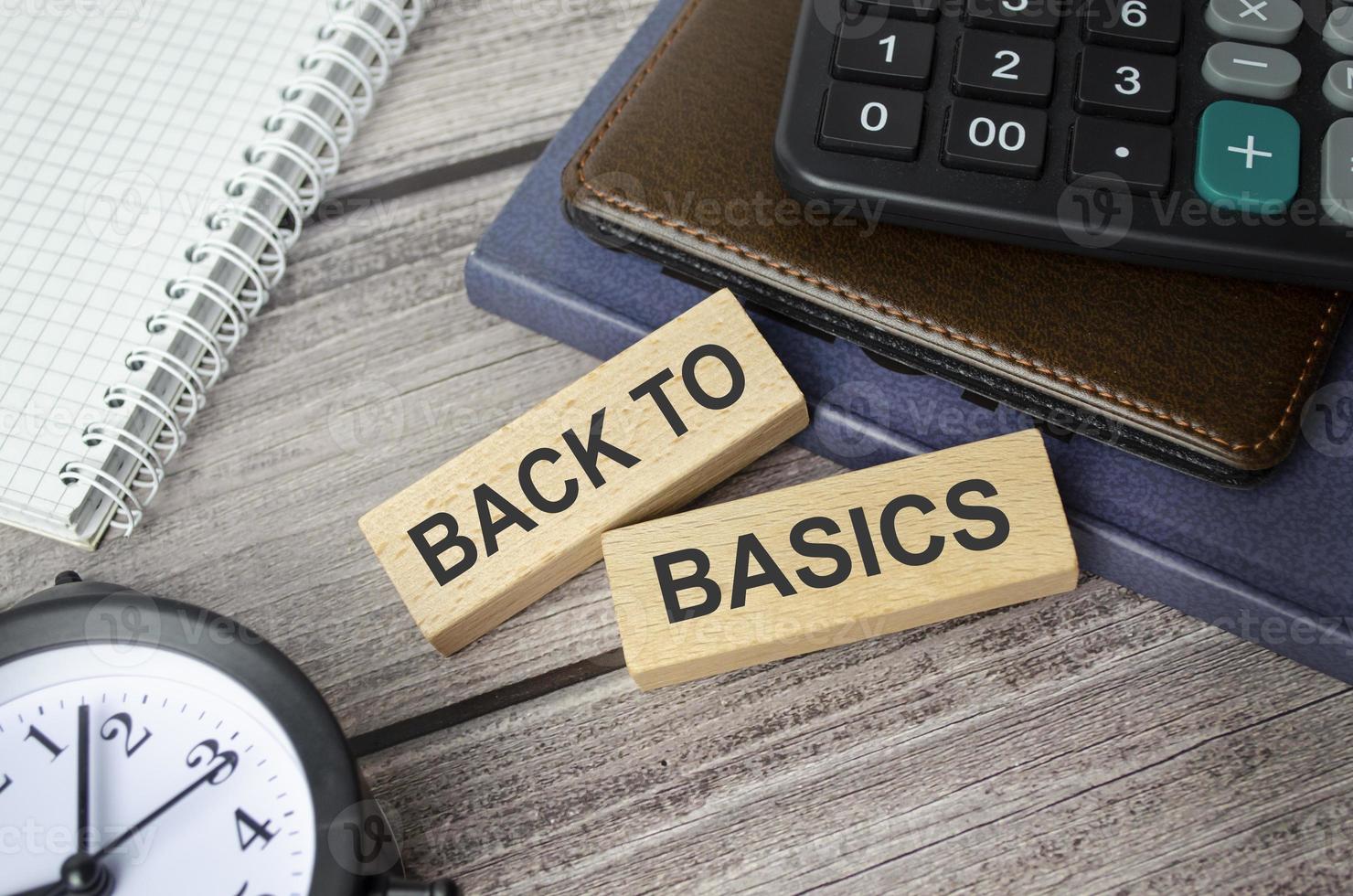 back to basics symbol. Concept words payday loans on wooden blocks photo