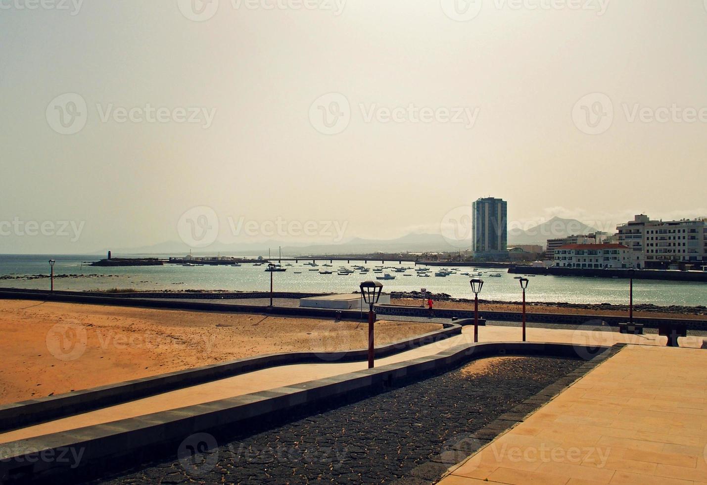 seaside landscape from the capital of the Canary Island Lanzarote Arrecife in Spain on a sunny warm summer day photo