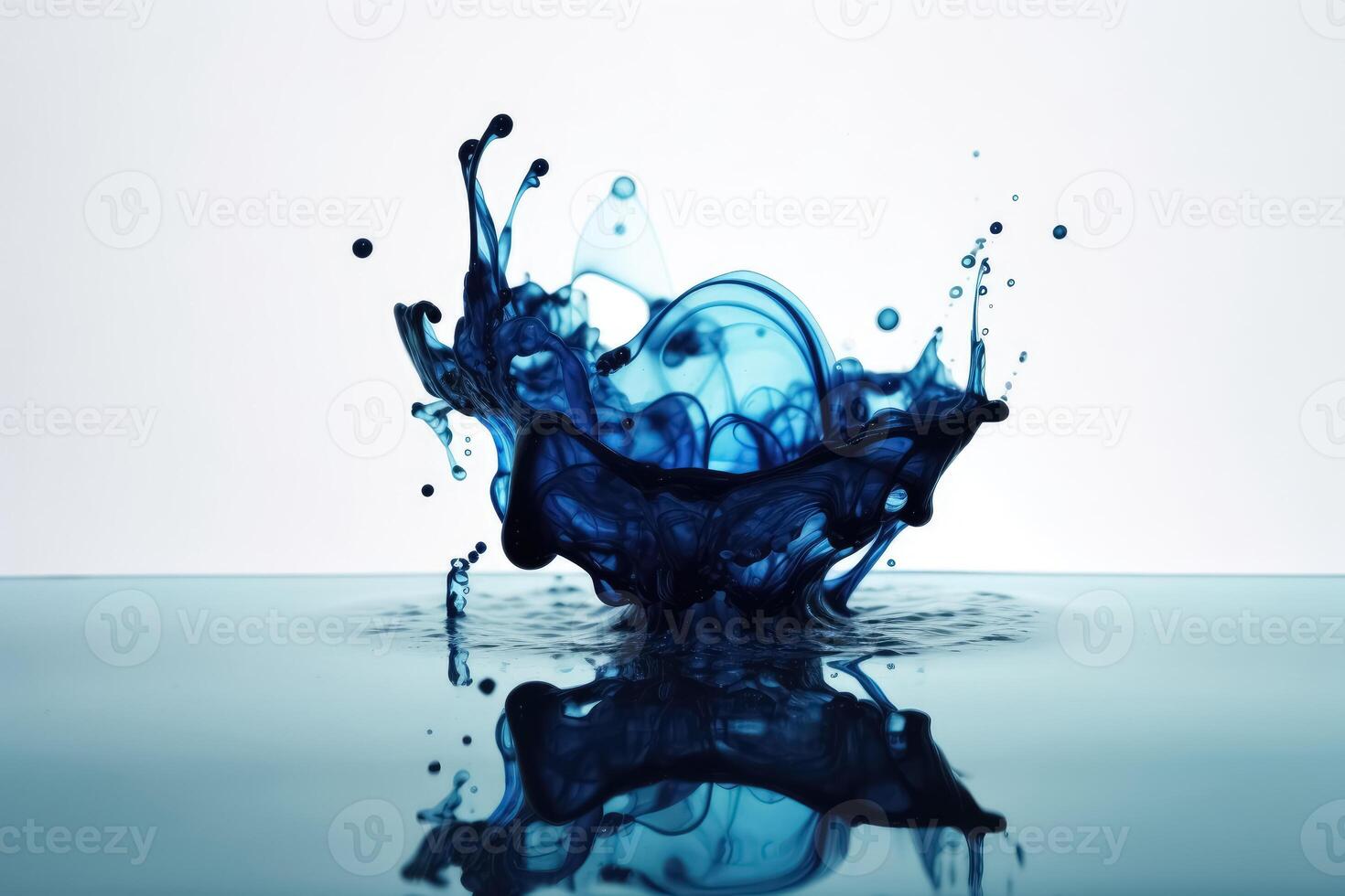 Blue ink dripping into water created with technology. photo