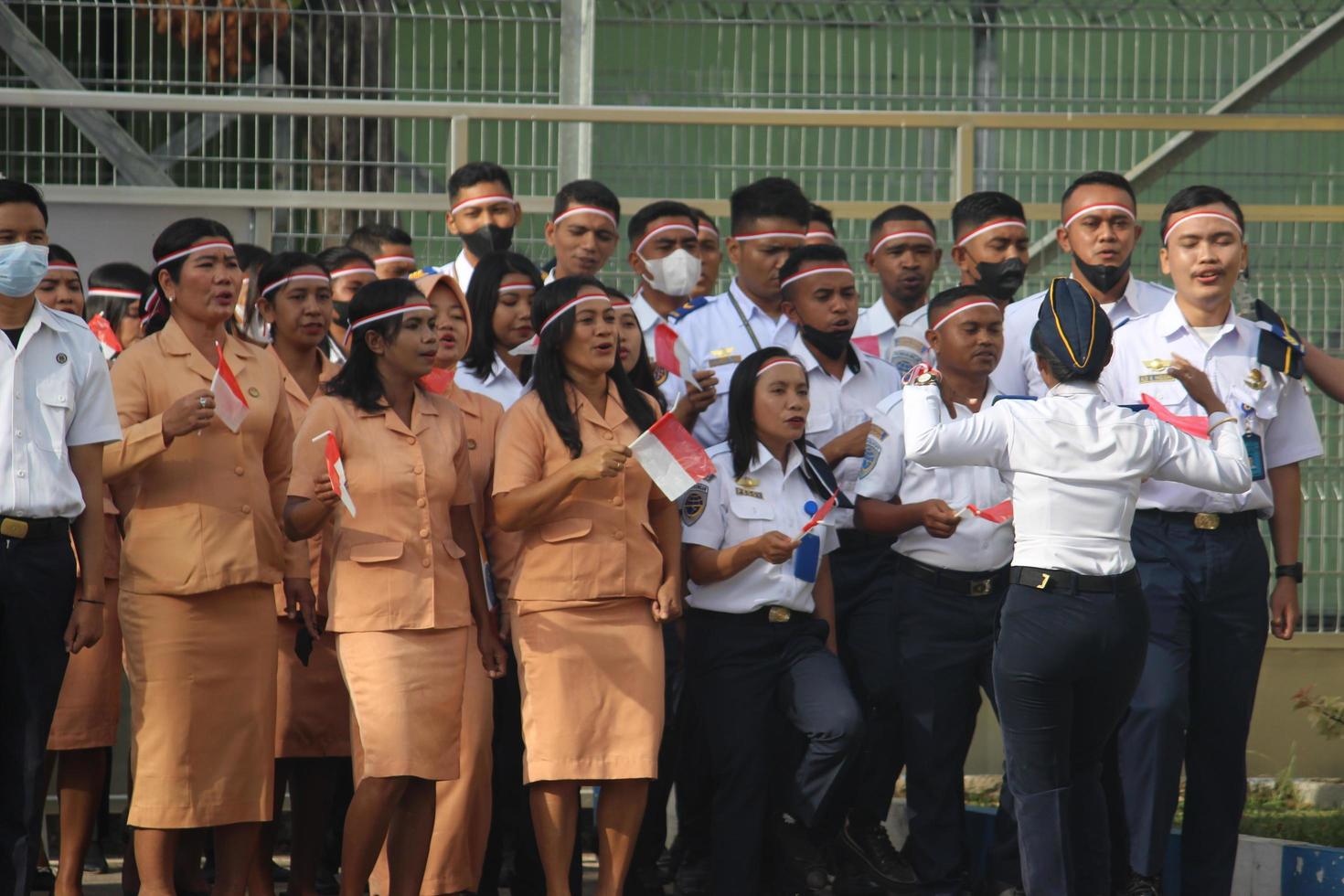 Atambua, Nusa Tenggara Timur, 2022 A group of people who are singing who have the spirit of nationalism photo