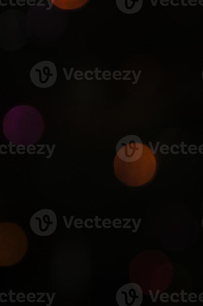 Abstract background with blurred colored lights photo