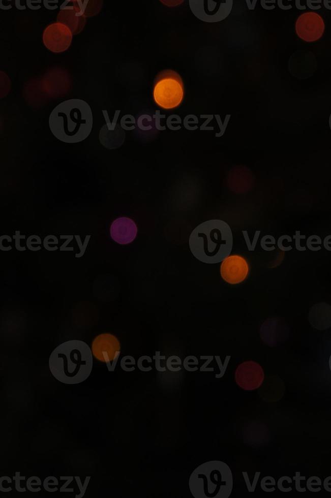 Abstract background with blurred colored lights photo