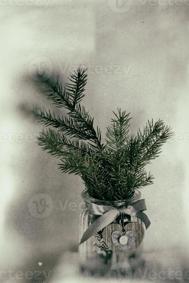 Christmas tree decoration in a decorative jug photo