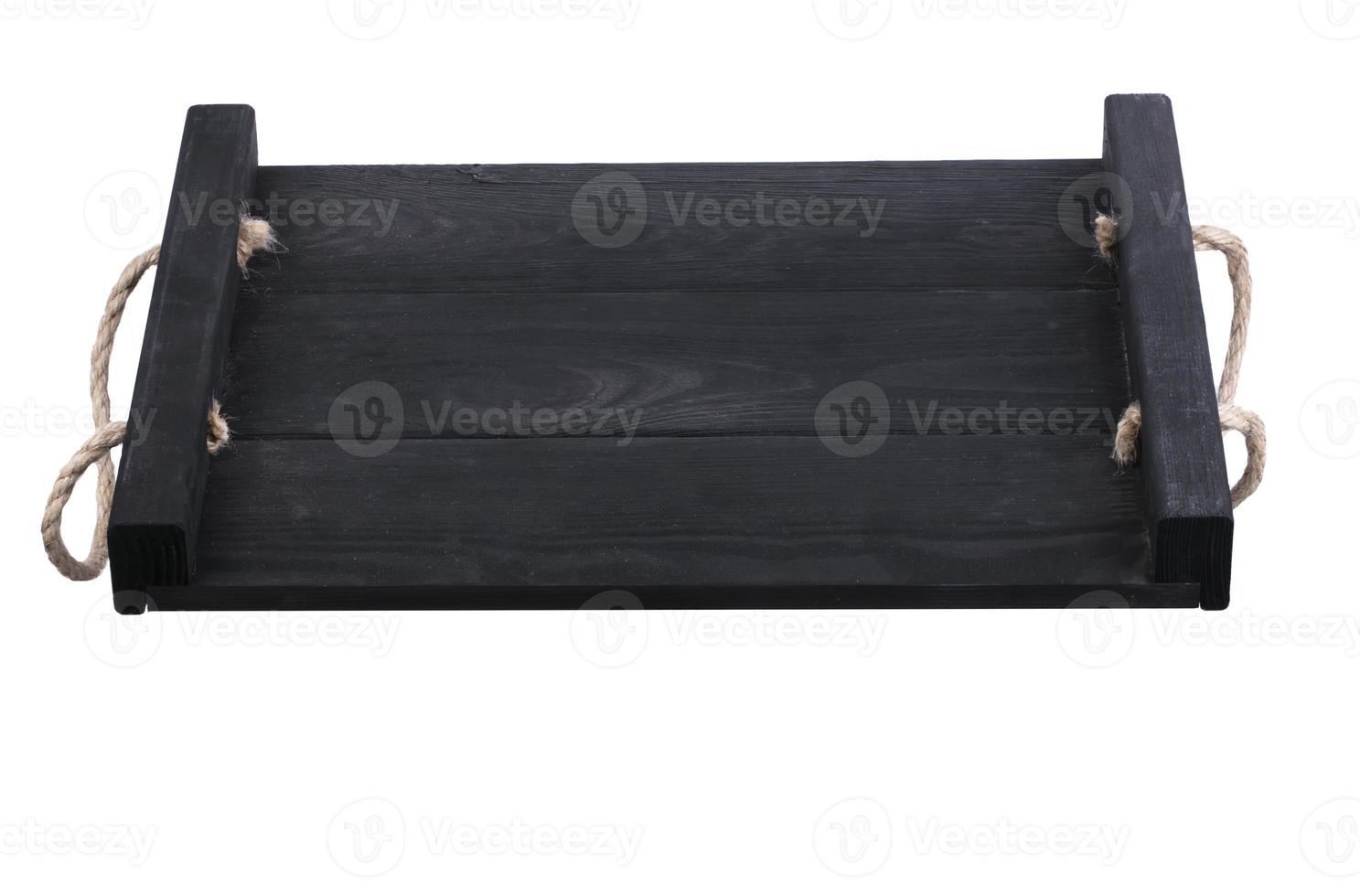 Wooden black tray on a white background. photo