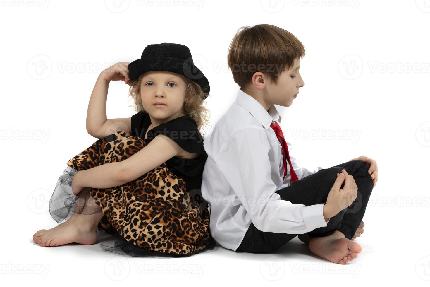 Beautiful children. Little girl and boy with their backs to each other. Funny children couple. Brother and sister. Valentines day and children photo