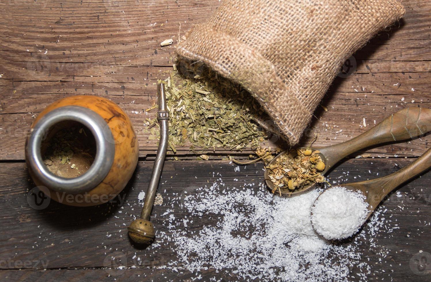 yerba mate infusion, with grated coconut and chamomile, called coconut mate photo