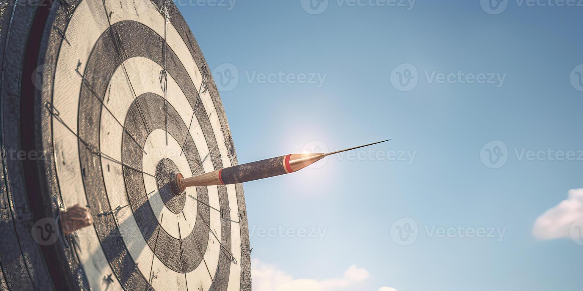 high success concept A red dart arrow aims at the target in the center of the dartboard. Target hit in the middle. . photo