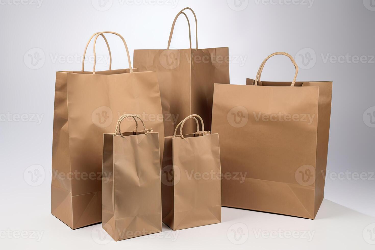 Paper bag mockups of shopping, gifts and food packages realistic vector design. White, brown and black bags or boxes, made of craft paper or cardboard with cord handle. . photo