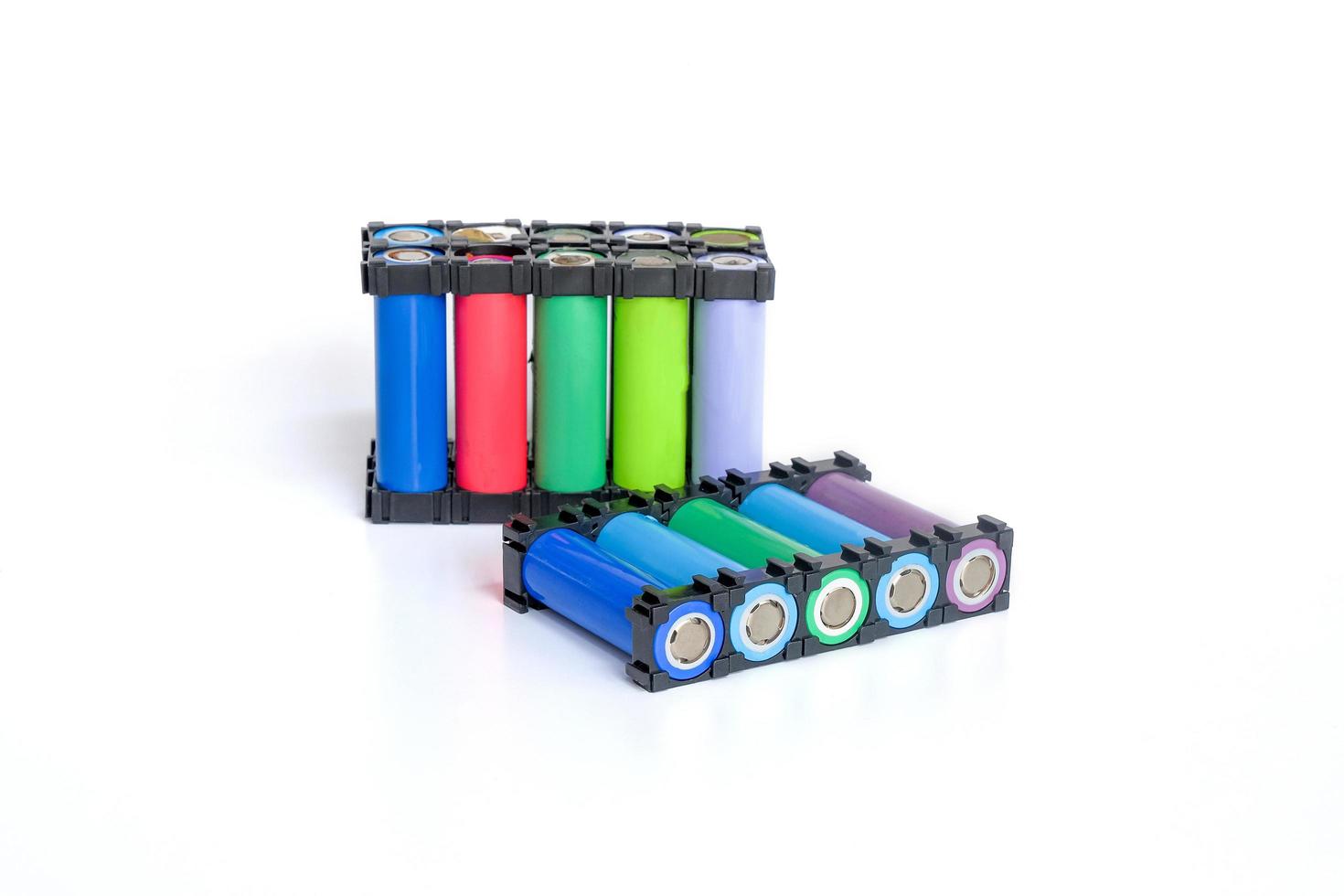 Reused Li ion 18650 battery pack in holder on white. photo