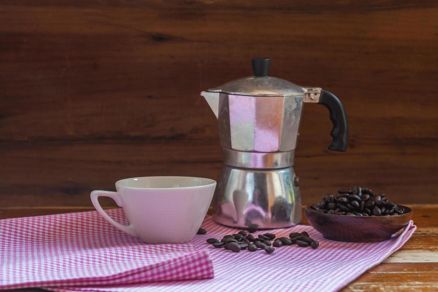 still life coffee bean and cup on wood photo