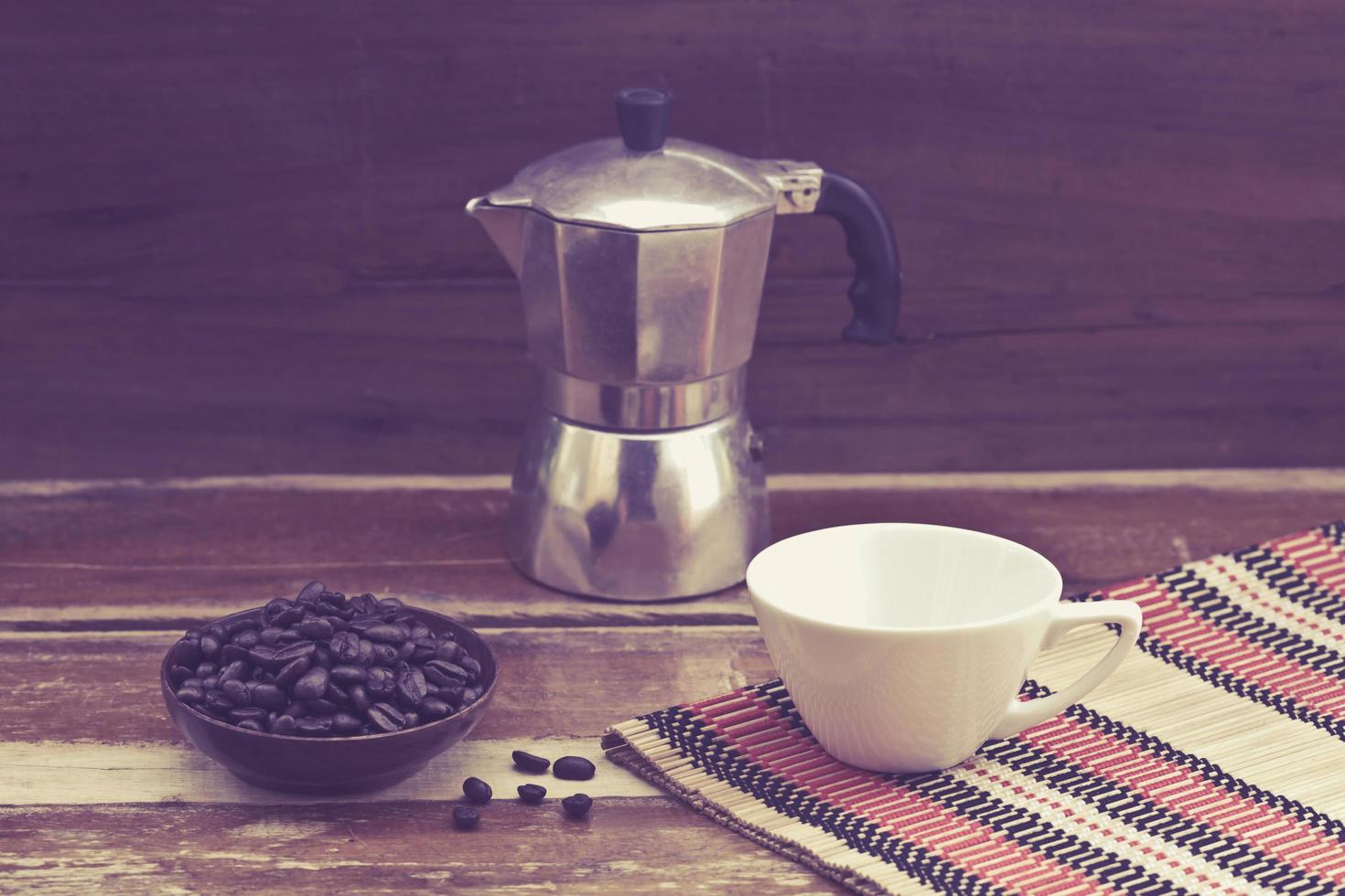 still life coffee bean and cup on wood photo