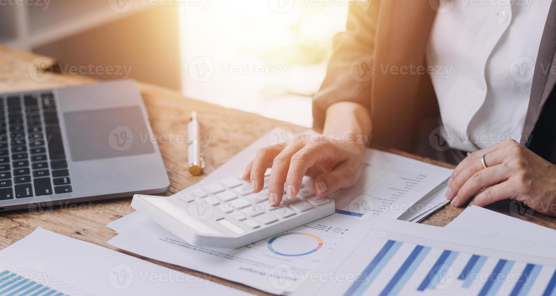 Business Documents, Auditor businesswoman checking searching document legal prepare paperwork or report for analysis TAX time,accountant Documents data contract partner deal in workplace office photo