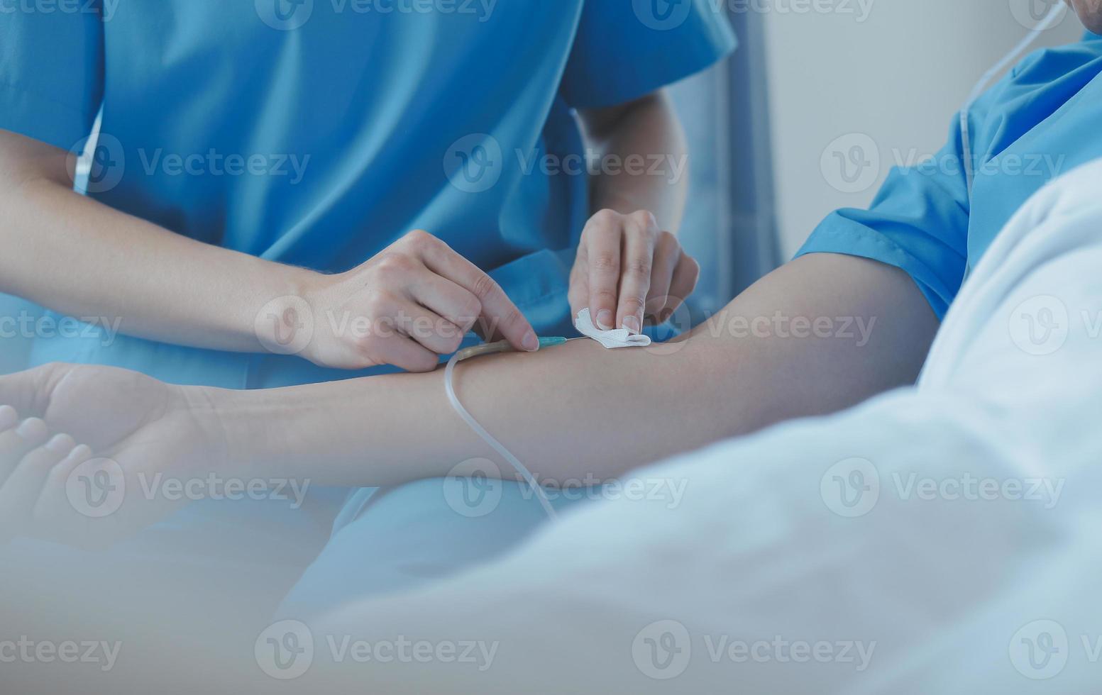 Women Asian doctors hold the patient hand and encourage and provide medical advice While checking the patient health in bed. Concept of Care and compassion, antenatal care, Threatened abortion photo