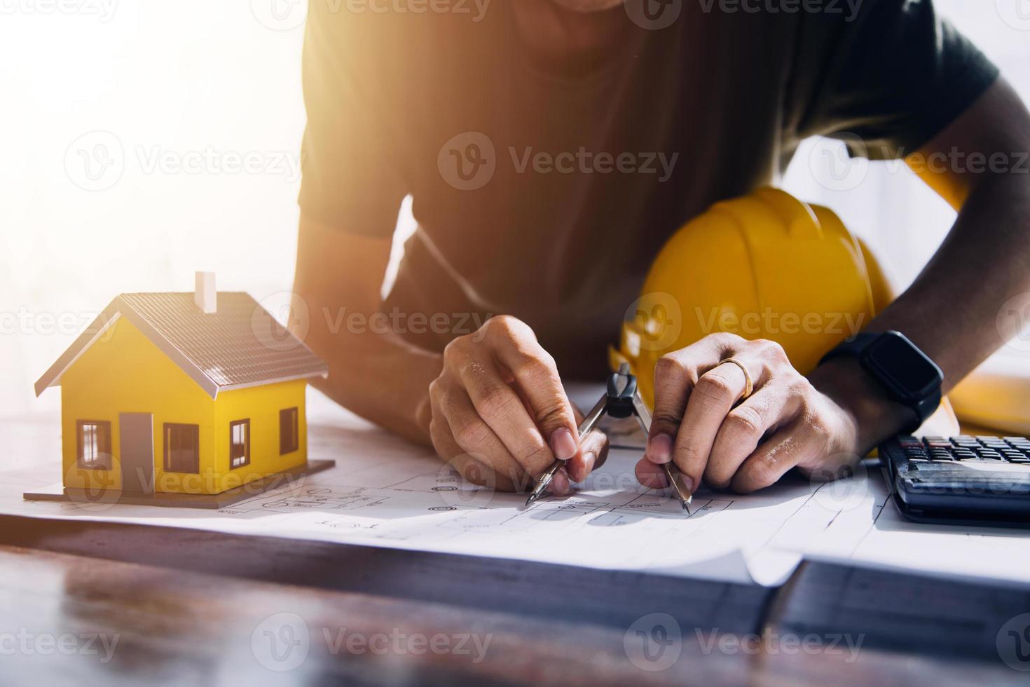 Two business man construction site engineer. Engineering objects on workplace with partners interacting on background photo