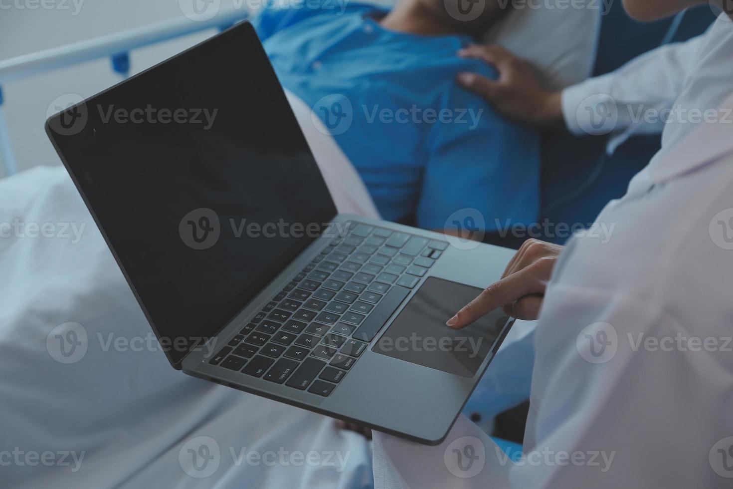 Women Asian doctors hold the patient hand and encourage and provide medical advice While checking the patient health in bed. Concept of Care and compassion, antenatal care, Threatened abortion photo