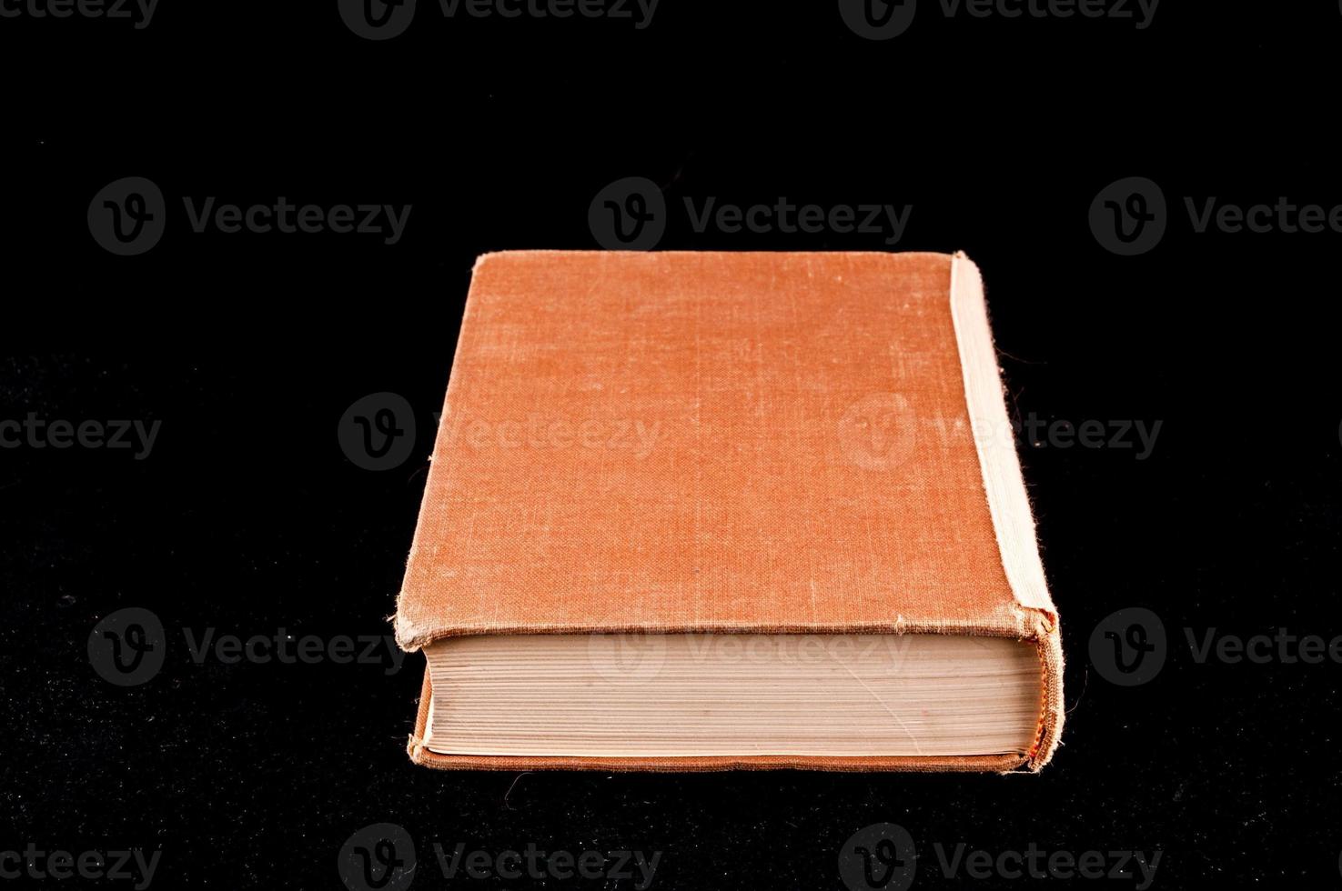 Book on dark background photo