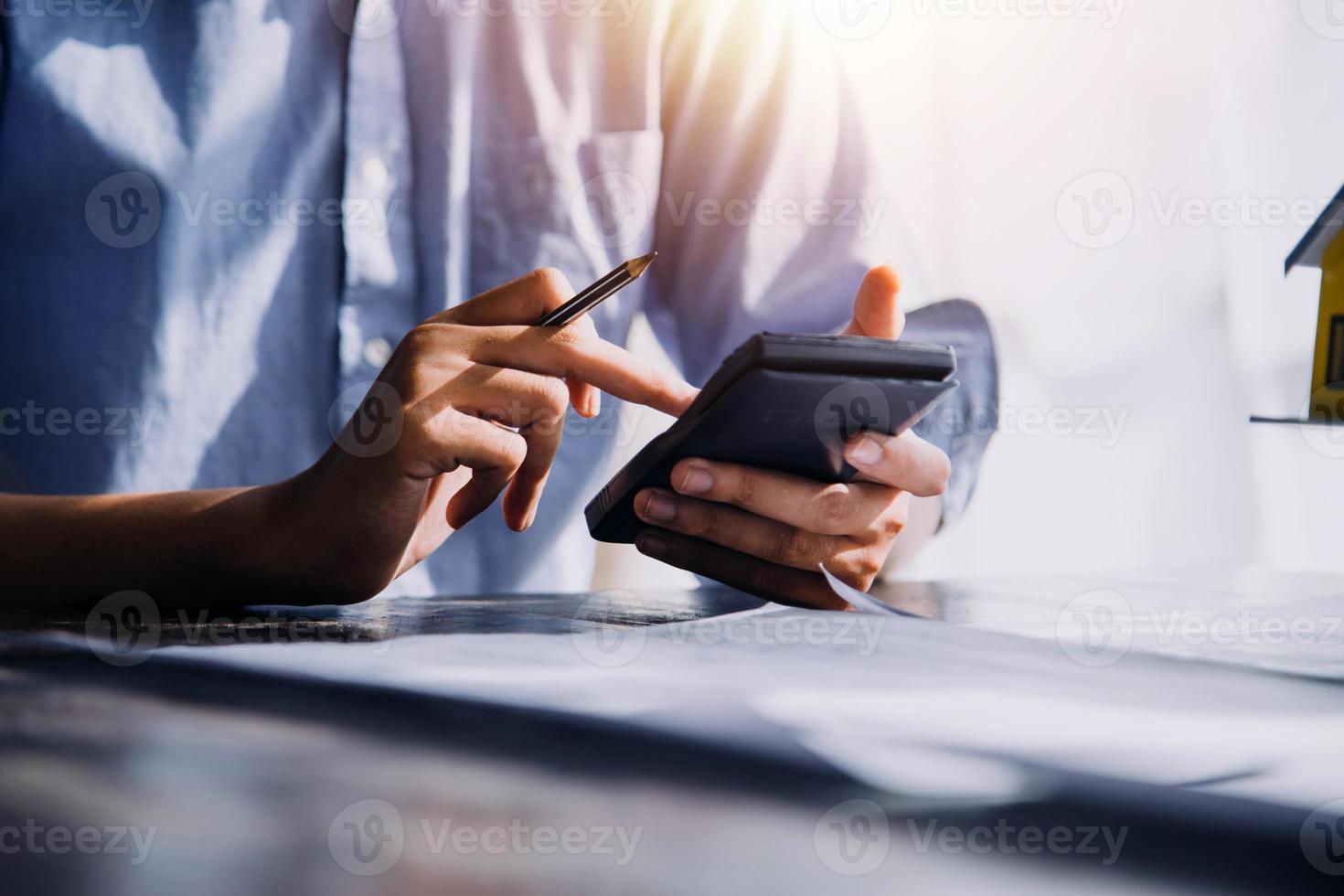 Two business man construction site engineer. Engineering objects on workplace with partners interacting on background photo
