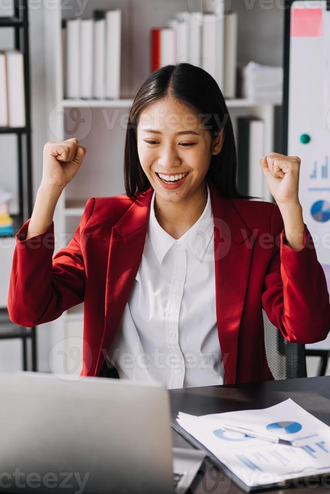Asian women are stressed while working on laptop, Tired asian businesswoman with headache at office, feeling sick at work, copy space photo