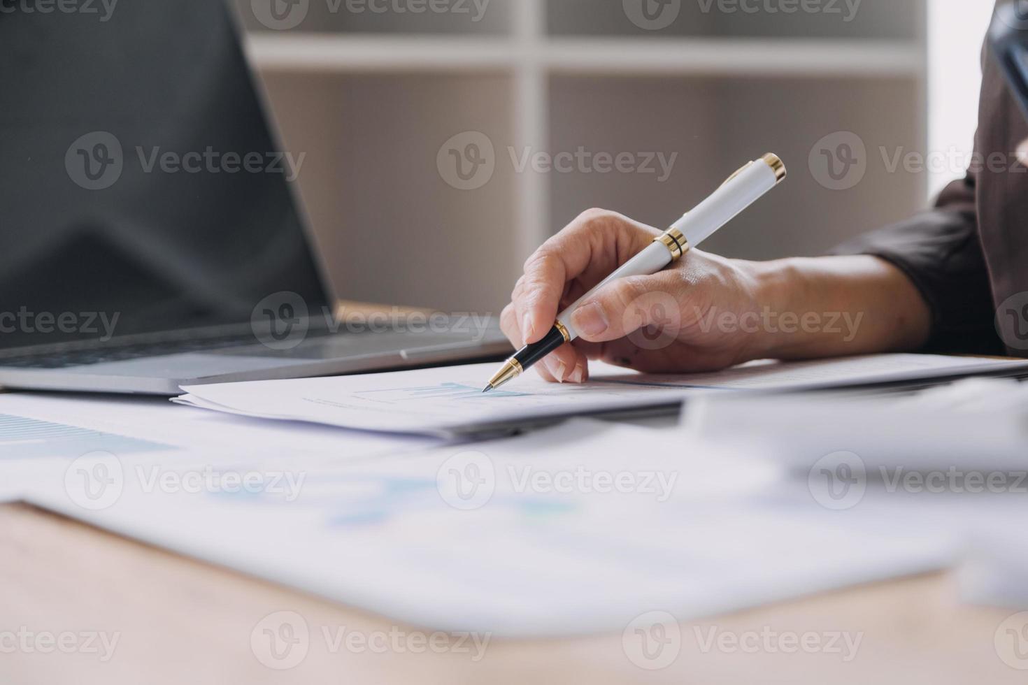 Business Documents, Auditor businesswoman checking searching document legal prepare paperwork or report for analysis TAX time,accountant Documents data contract partner deal in workplace office photo