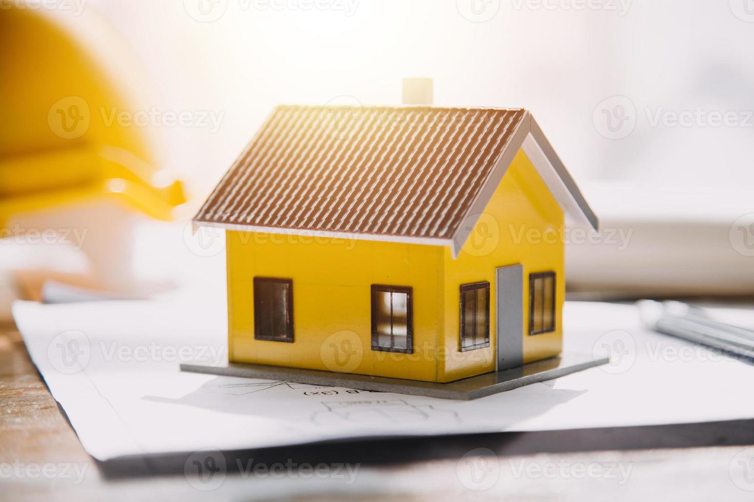 Two business man construction site engineer. Engineering objects on workplace with partners interacting on background photo