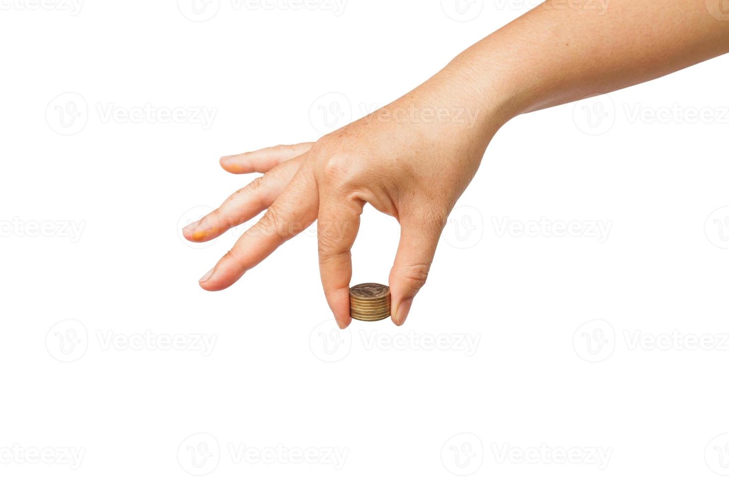 hand holding coin stack on white photo