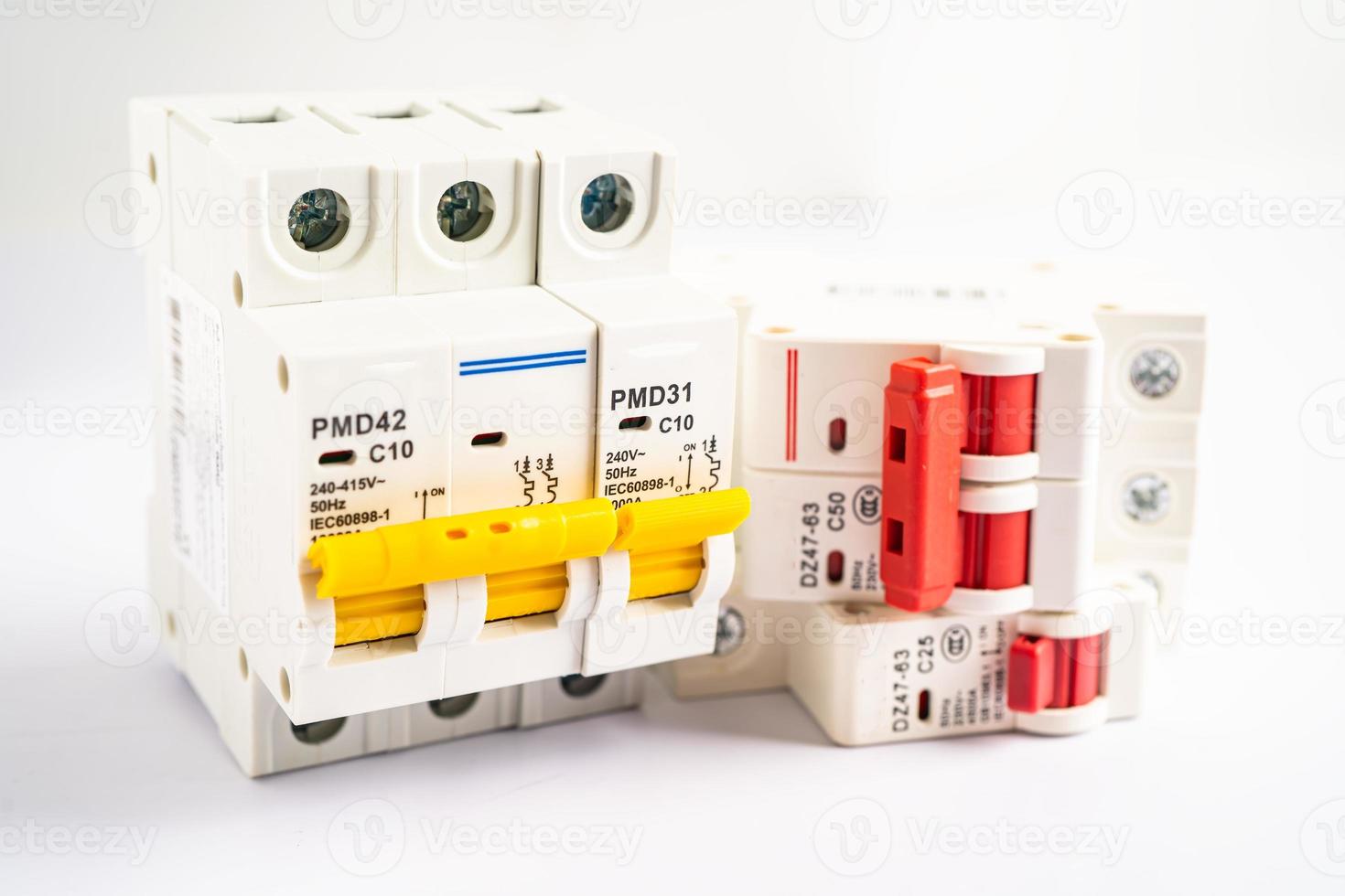 Automatic circuit breaker on white background, control and protect electrical power system. photo