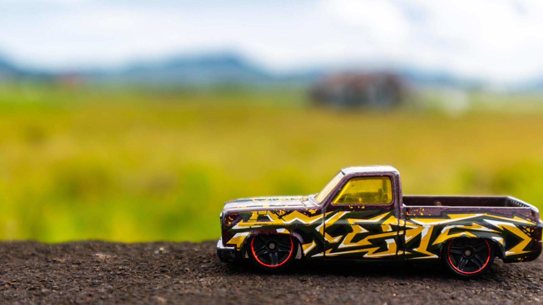 minahasa, Indonesia  January 2023, toy car in the rice field photo