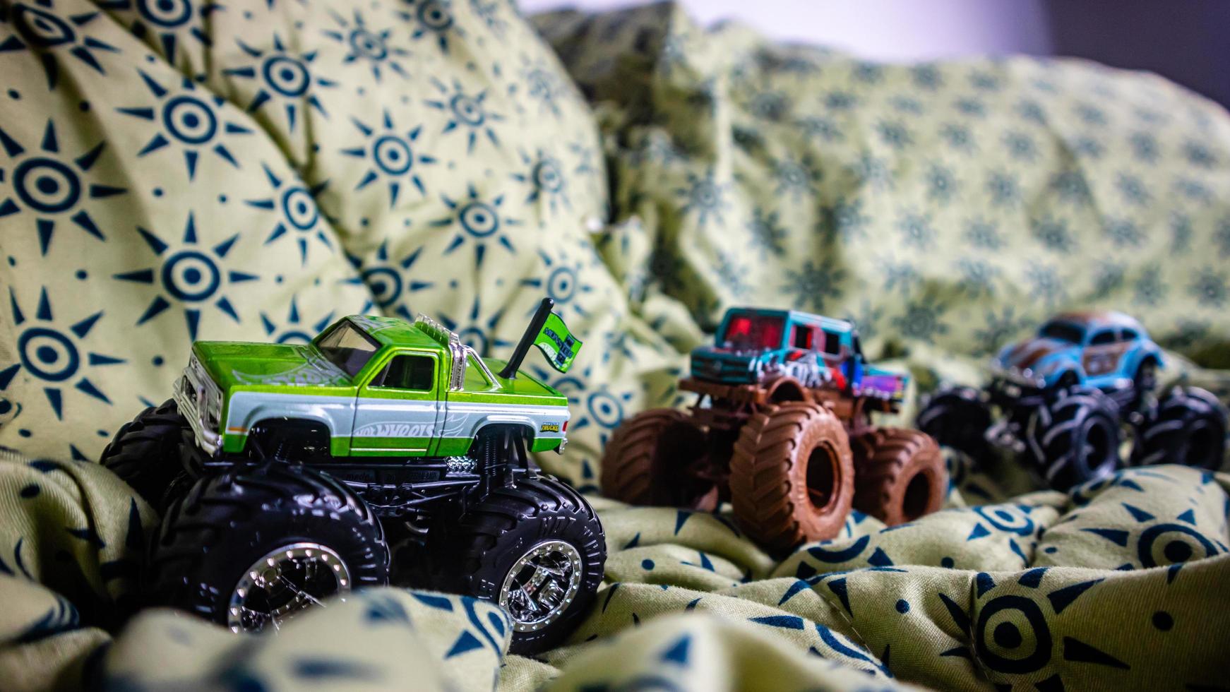 toy monster car on blanket photo