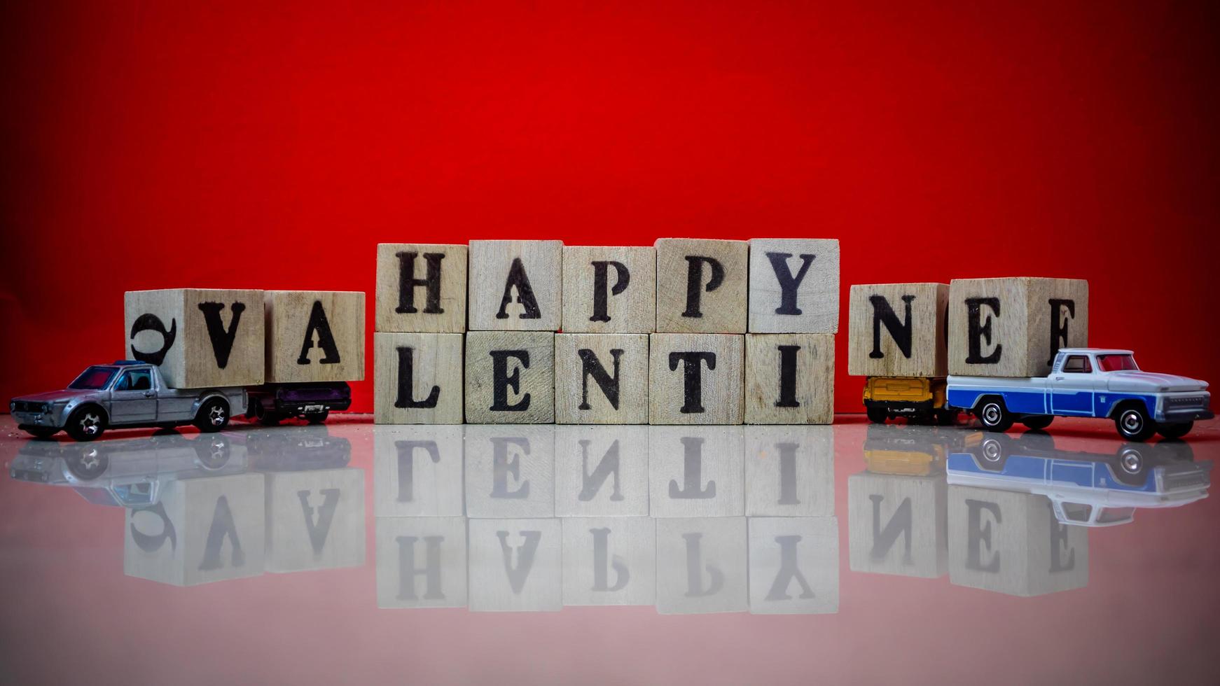 minahasa, Indonesia  January 2023, Happy valentine's day from stacked wooden blocks photo