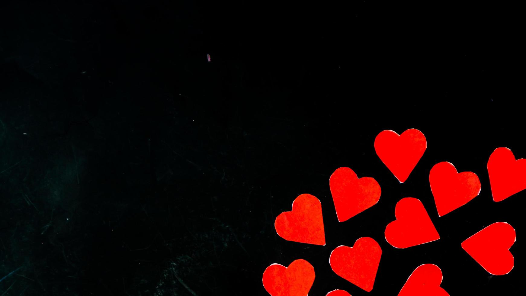 red heart on black background for valentine day photo