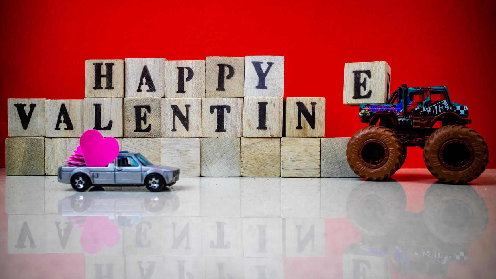 minahasa, Indonesia January 2023, Happy valentine's day from stacked wooden blocks photo