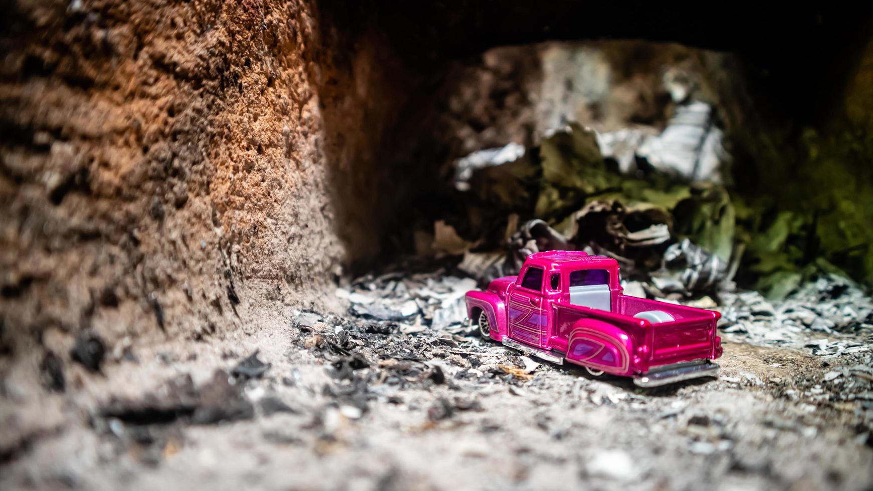 South Minahasa, Indonesia  January 2023, the toy car in the furnace looks like in a cave photo