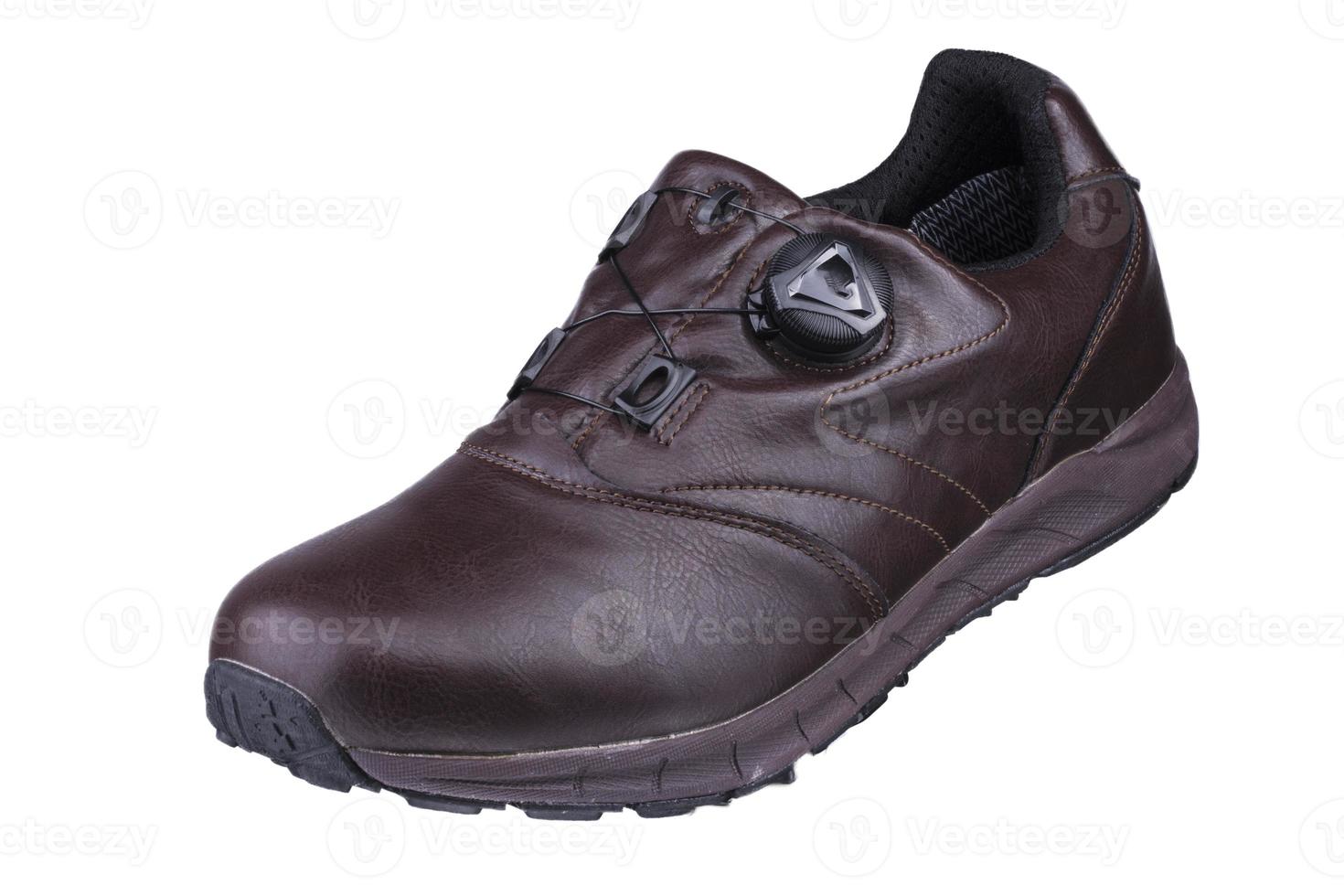 Brown leather sneaker on a white background. Men's sports shoes. photo