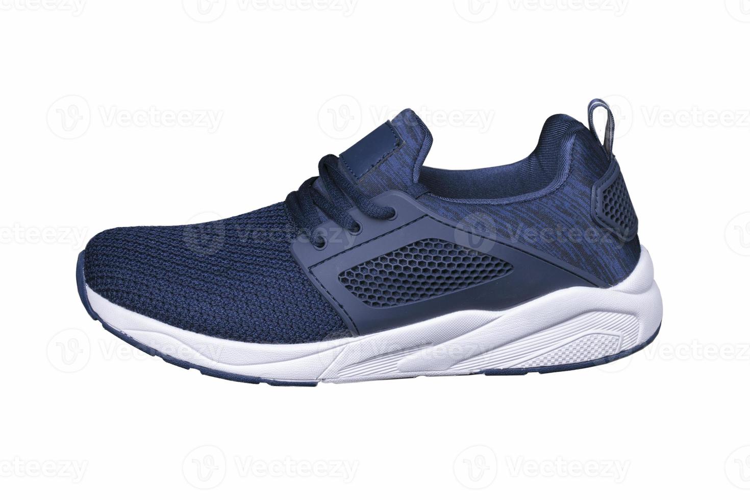 Sport shoes. Blue sneaker made of fabric with leather accents. photo