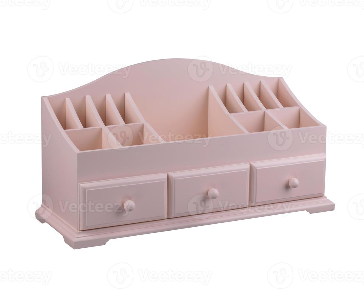 Pink wooden casket with shelves with drawers. A small cabinet for cosmetics. photo