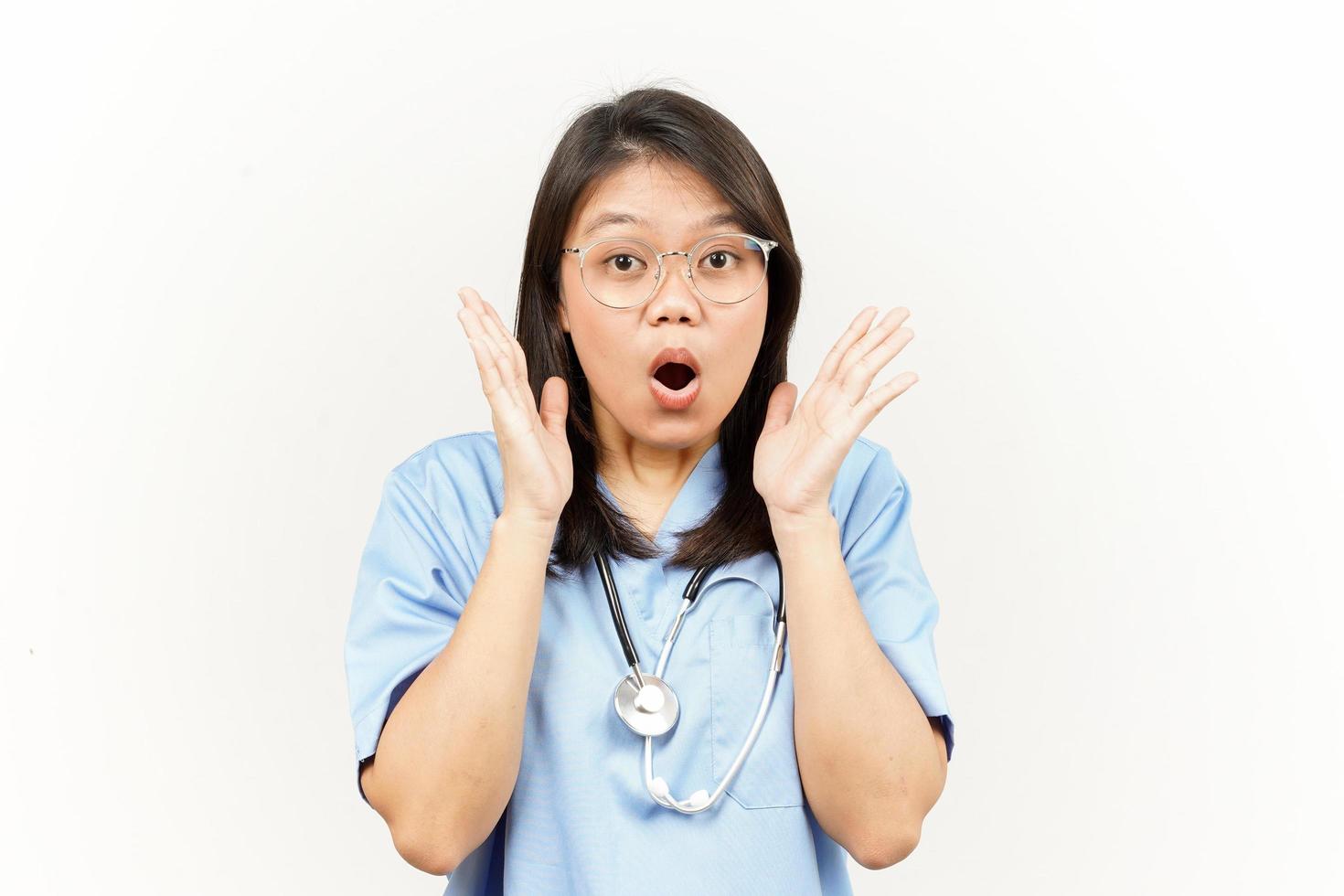 WOW and Shocked Face Expression Of Asian Young Doctor Isolated On White Background photo
