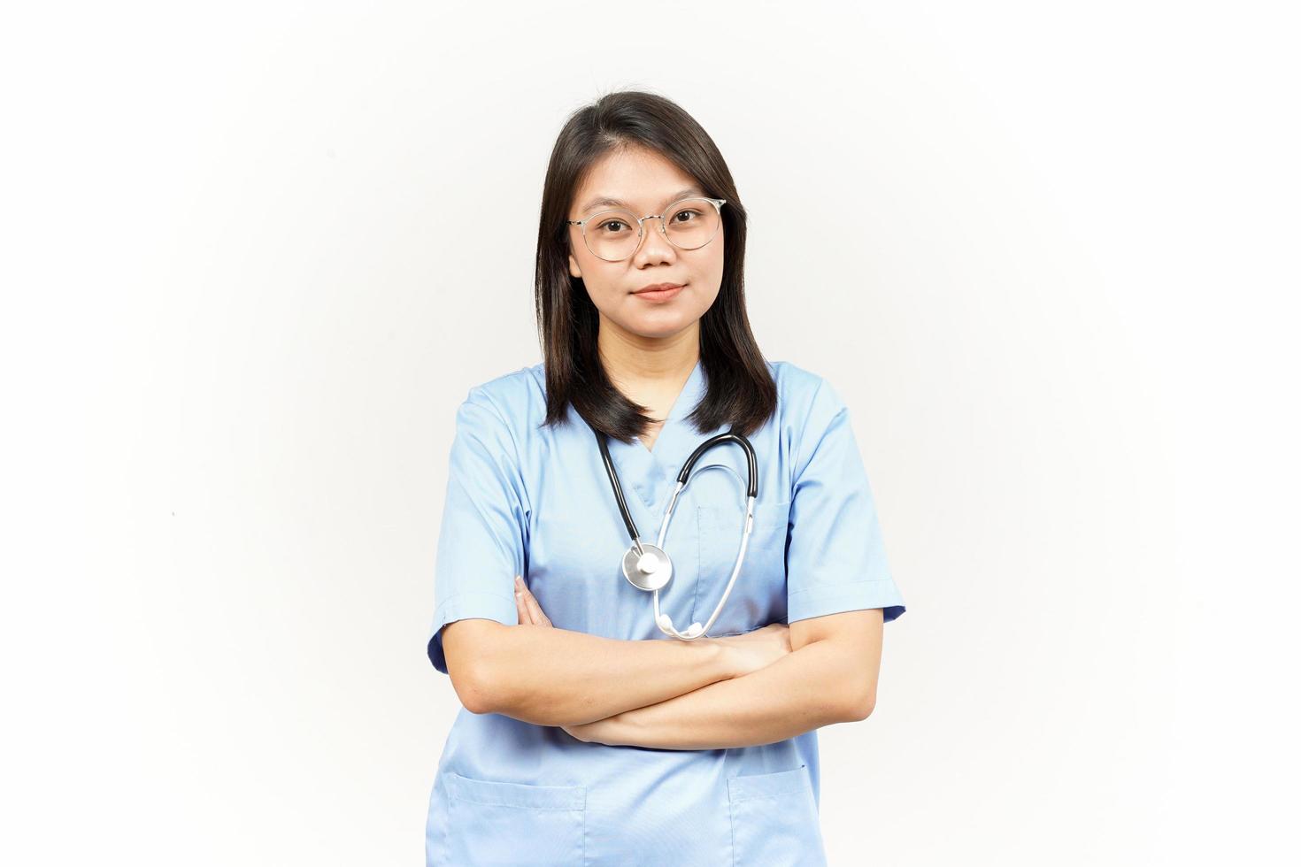 Smiling and Folding arms Of Asian Young Doctor Isolated On White Background photo