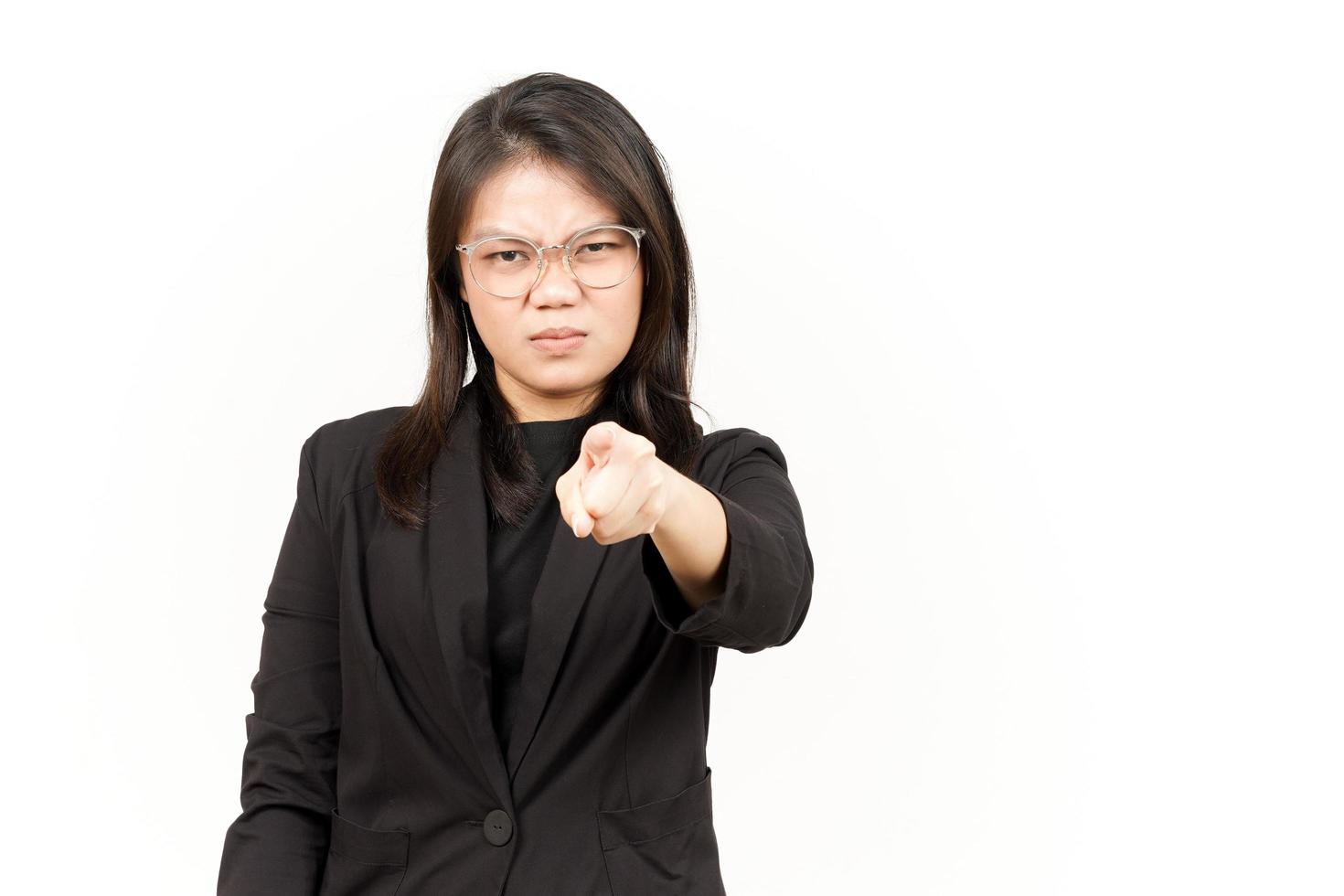 Angry and Pointing to Camera Of Beautiful Asian Woman Wearing Black Blazer Isolated On White photo