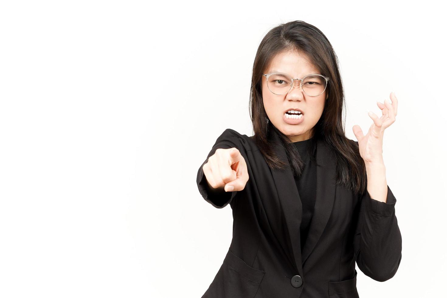 Angry and Pointing to Camera Of Beautiful Asian Woman Wearing Black Blazer Isolated On White photo