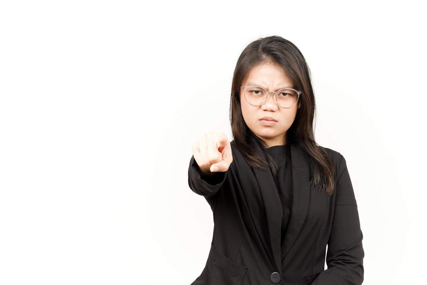 Angry and Pointing to Camera Of Beautiful Asian Woman Wearing Black Blazer Isolated On White photo