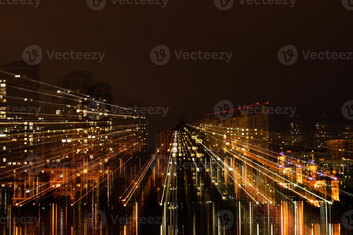 night city in motion of light lines photo